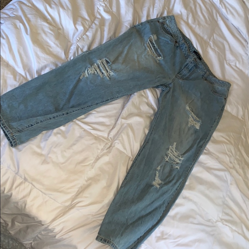 Light blue ripped jeans